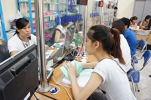 Thực hiện đẩy mạnh chi trả dịch vụ an sinh xã hội qua phương tiện thanh toán không dùng tiền mặt